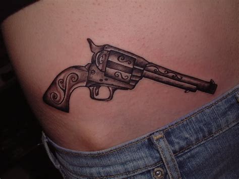 Revolver tattoo