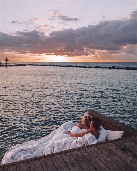 A romantic beach getaway with a beautiful sunset