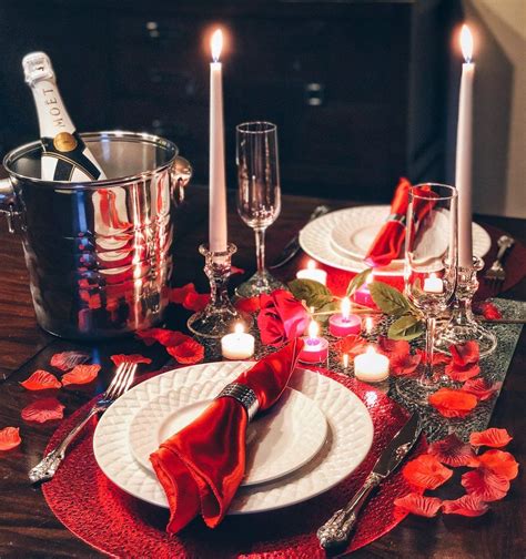 A romantic dinner setup with candles and flowers