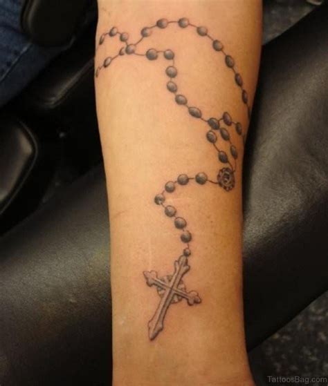 Rosary tattoo design on the arm