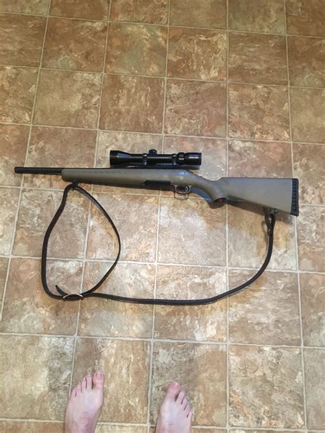 Ruger American rifle with a sling at the range