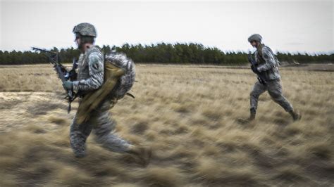 A person rushing forward, symbolizing urgency