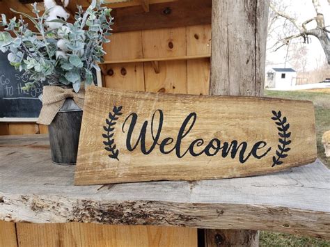 Rustic wooden sign on a Christmas tree