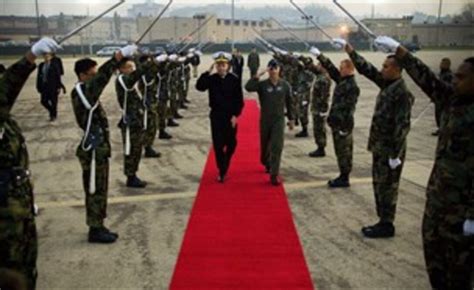 A soldier performing a saber salute