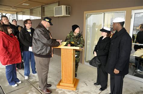 Sailors participating in the Adopt-a-School program