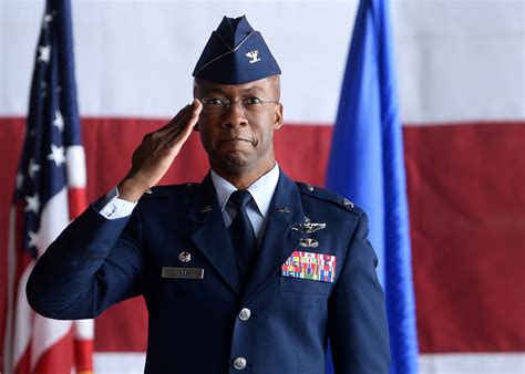 An image of an Air Force personnel saluting