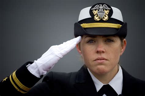 An image of a Navy personnel saluting