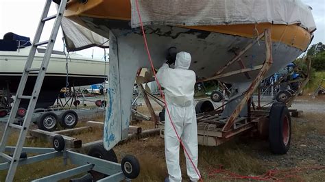 Sanding the boat hull