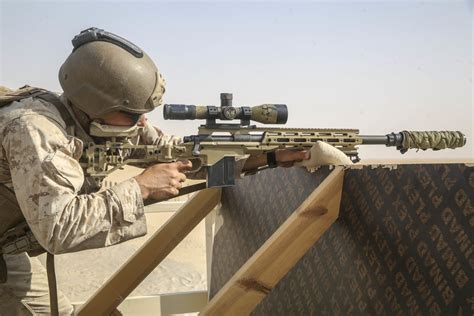 Scout Sniper providing security for a ground unit