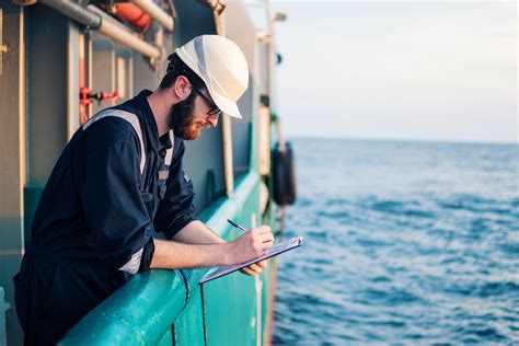 Seamen working on a cargo ship