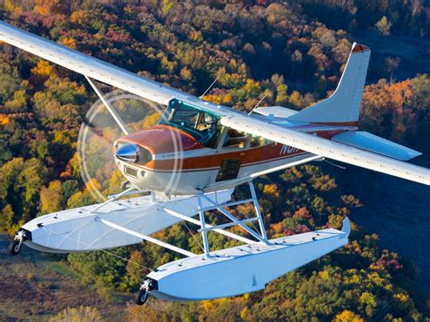 A person flying a remote control seaplane