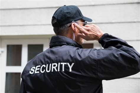 A security specialist working on a computer