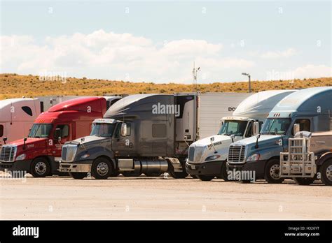 Semi-truck at truck stop coloring page