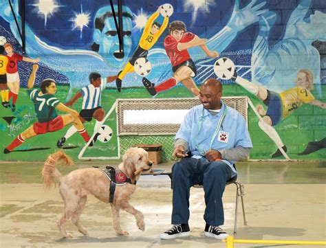 Service dog trainers speaking at a conference