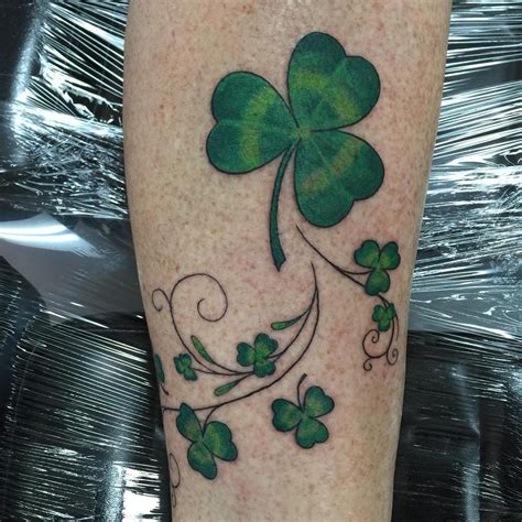 Various minimalist shamrock tattoo designs