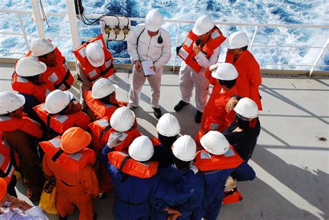 Ship crew on the deck during a storm