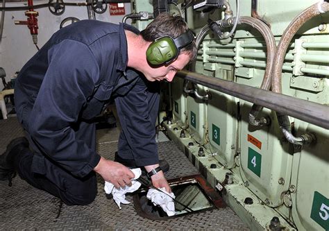 Ship Engineer Checking Equipment