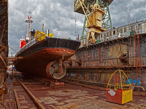 Welders working in shipbuilding and repair