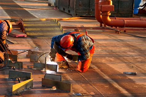 Welder working in a shipyard