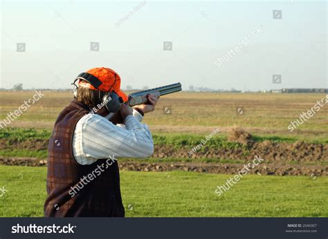 Left-handed shooter at a shooting range