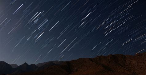 A shooting star in a landscape