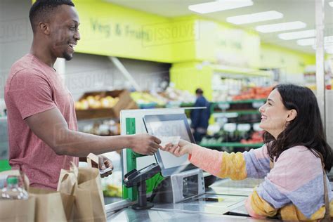 A person shopping with cash