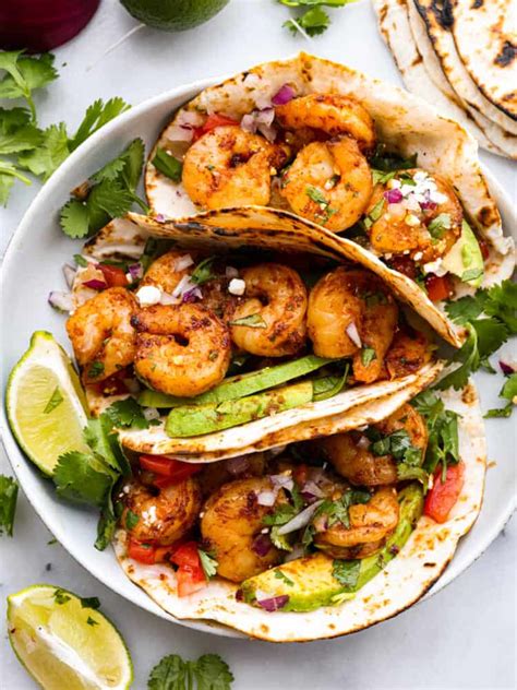 Shrimp tacos with salsa and avocado