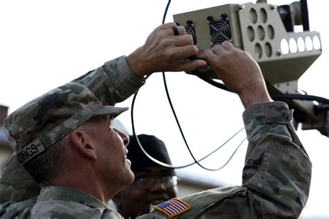 Signal Support Systems Specialist working on a communication system