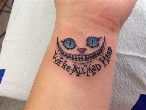 Simple Alice Wonderland Tattoo