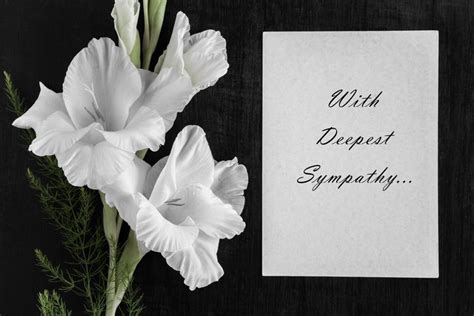 A simple condolence card with a floral design