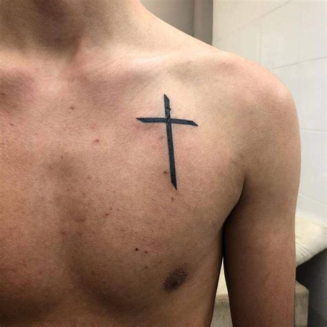 Simple cross chest tattoo ideas