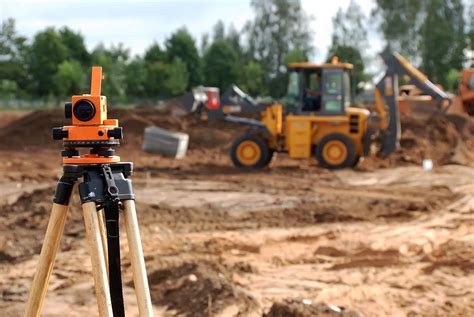 Civil Engineer conducting site investigation and surveying