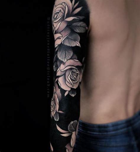 Description of Skull and Rose Arm Sleeve Tattoo