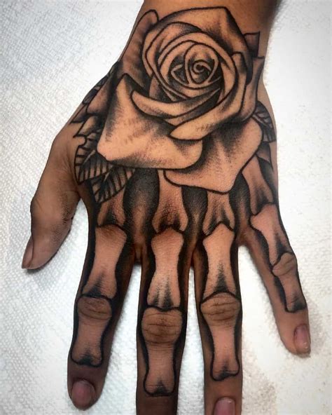 Skull Hand Tattoos