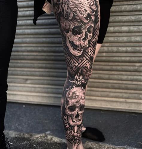 Skull leg sleeve tattoo