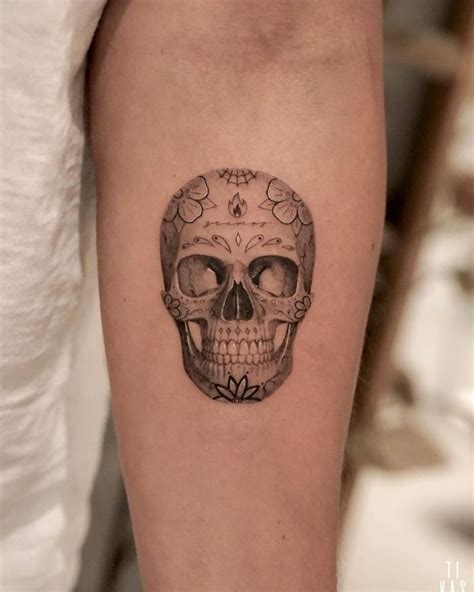 Skull bicep tattoos