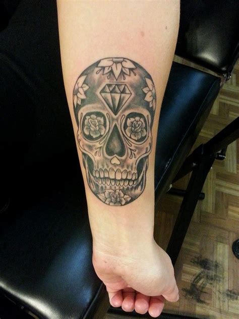 Skull wrist tattoo