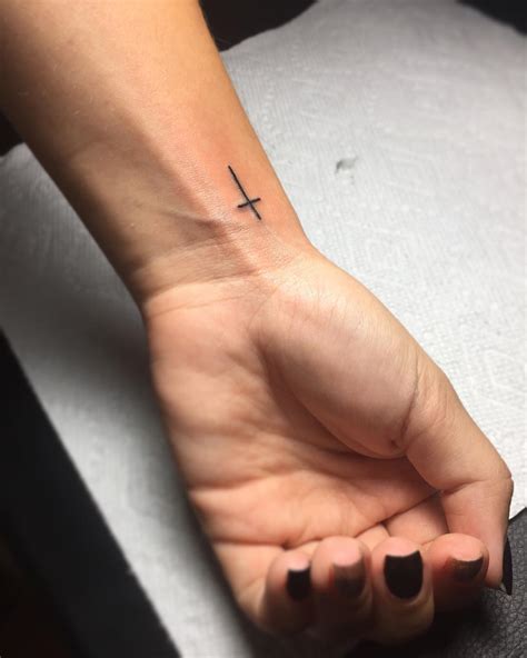 Description of Small Cross Tattoo