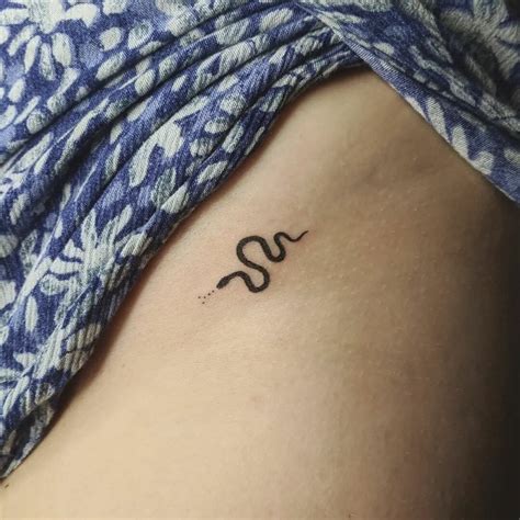 Small snake tattoos for women