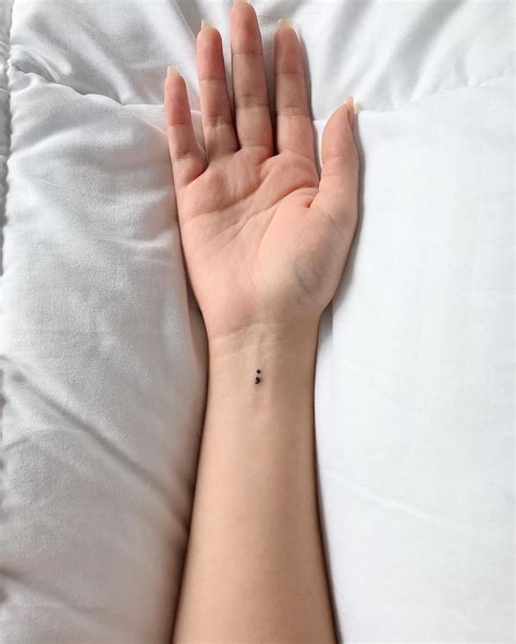 Small wrist tattoos can be placed on either the inner or outer wrist