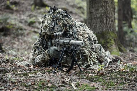 Sniper in ghillie suit