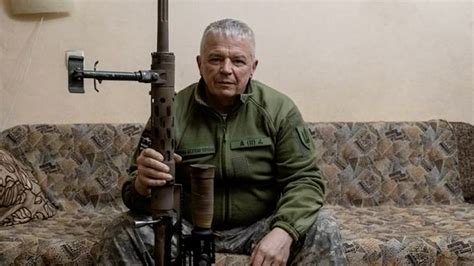 Ukrainian sniper taking aim for the record-breaking shot