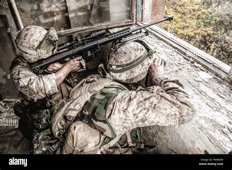 A sniper team in action, highlighting the importance of teamwork and coordination