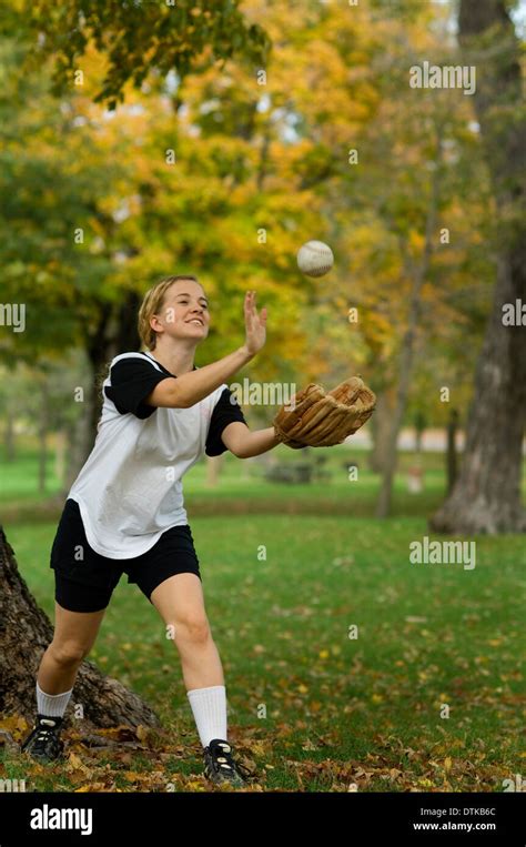 Softball player catching