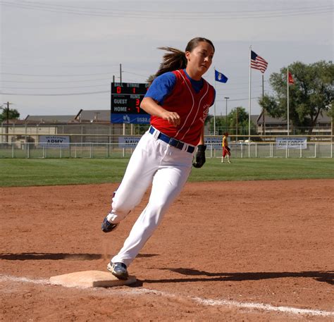 Softball player running