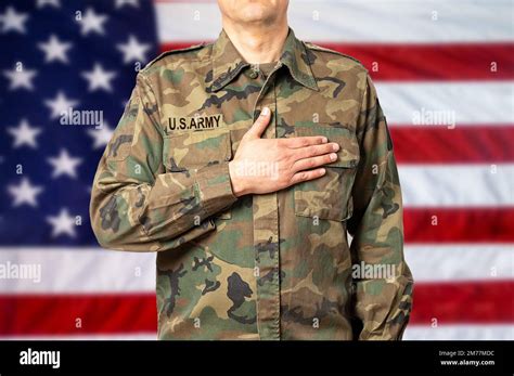 A soldier pledging allegiance to the flag