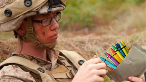 Soldiers eating crayons for stress relief