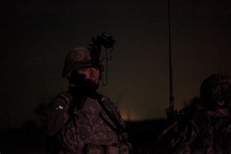 Soldiers on patrol at night