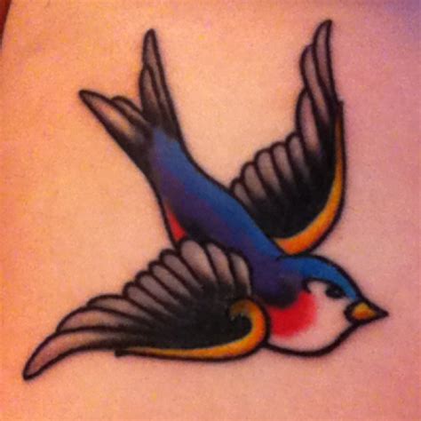 Sparrow tattoos on the ribcage