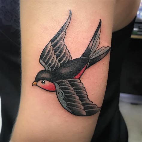 Sparrow tattoos with flowers